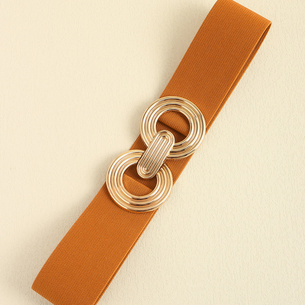 
                      
                        Cinturón ancho elástico con hebilla geométrica
                      
                    